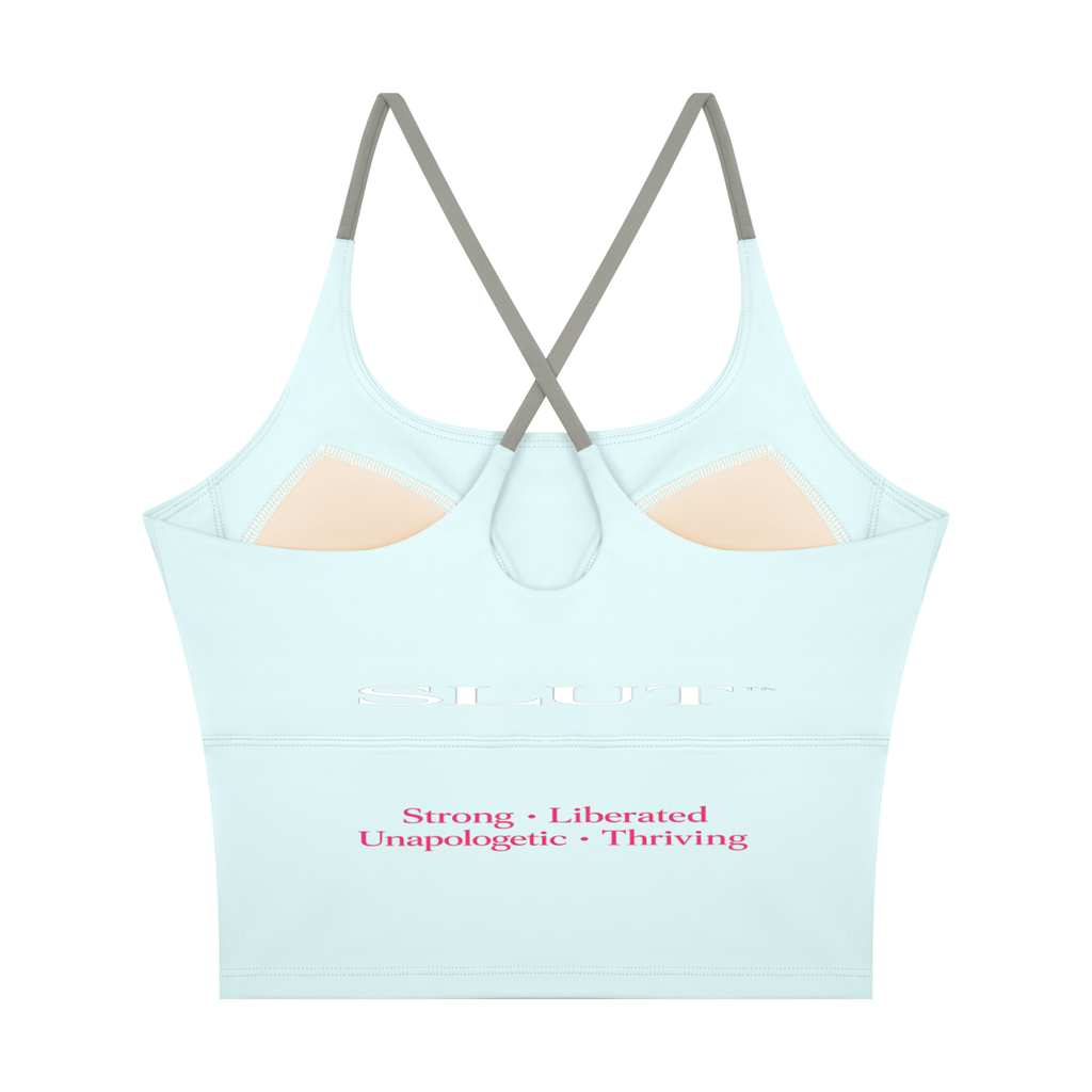 SLUT CROSS\-BACK CROP SPORTS BRA  **STRONG • LIBERATED UNAPOLOGETIC  THRIVING