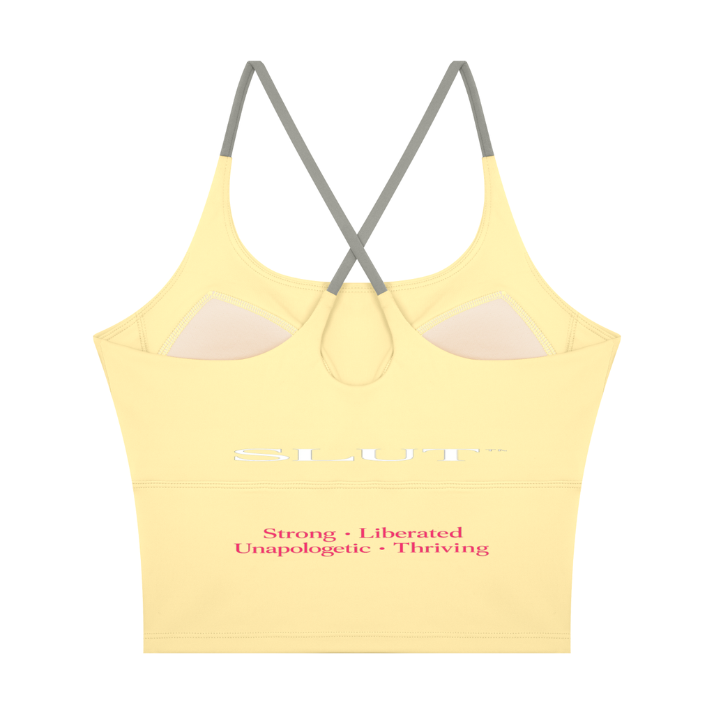 SLUT CROSS\-BACK CROP SPORTS BRA  **STRONG • LIBERATED UNAPOLOGETIC  THRIVING