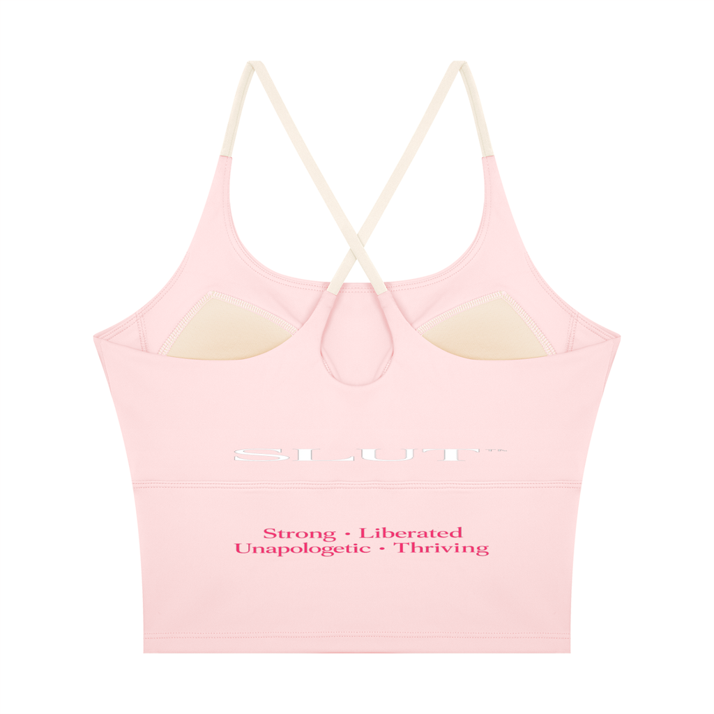 SLUT CROSS\-BACK CROP SPORTS BRA  **STRONG • LIBERATED UNAPOLOGETIC  THRIVING
