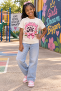 Black youth model wearing Adorable Fit pink bow and flowers off-white graphic tee