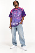 Cross My Heart Painted Pain one-of-one tee on model with light jeans and white sneakers