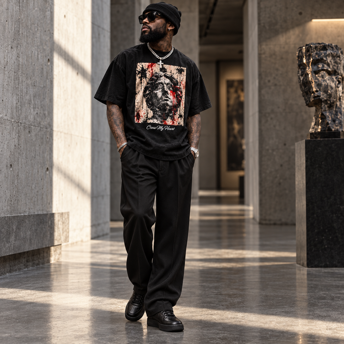 Model wearing Sacred Relic Statue Tee