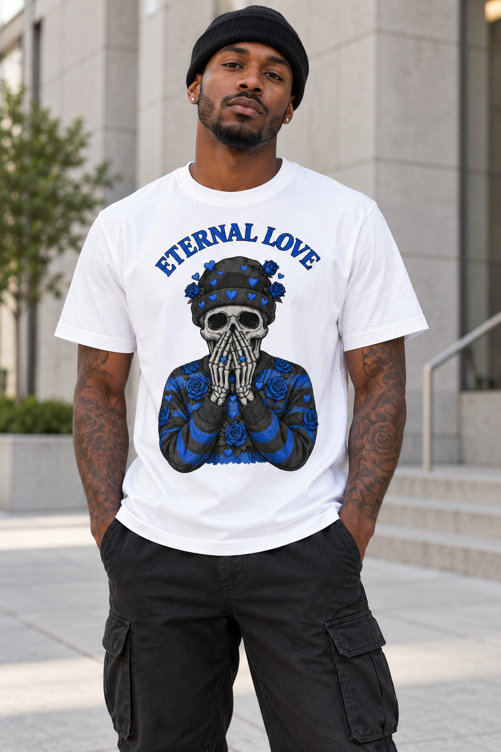 Male model wearing the white Eternal Love blue skull graphic tee